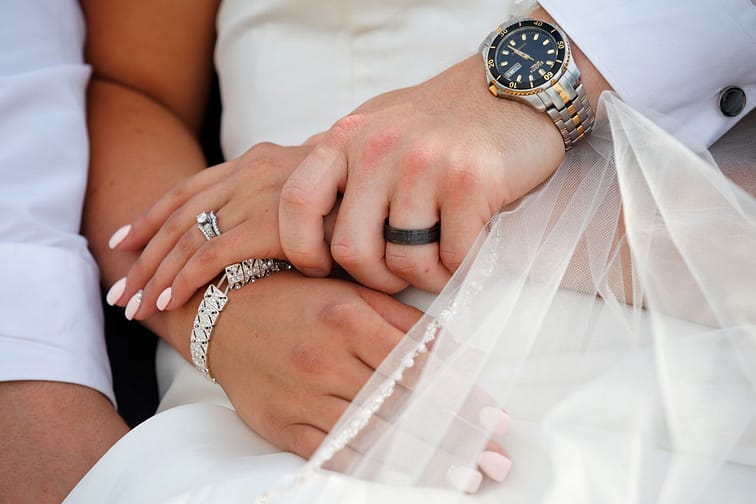bride and groom hands
