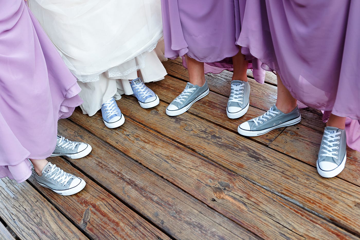 bride and brides maids wearning sneakers